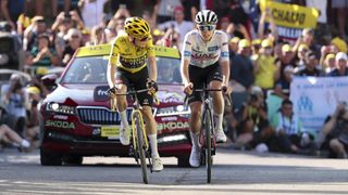 Vingegaard looks across to Pogacar on the Tour de France 