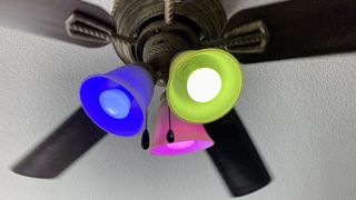 Philips Hue White and Color smart bulb in a ceiling fan