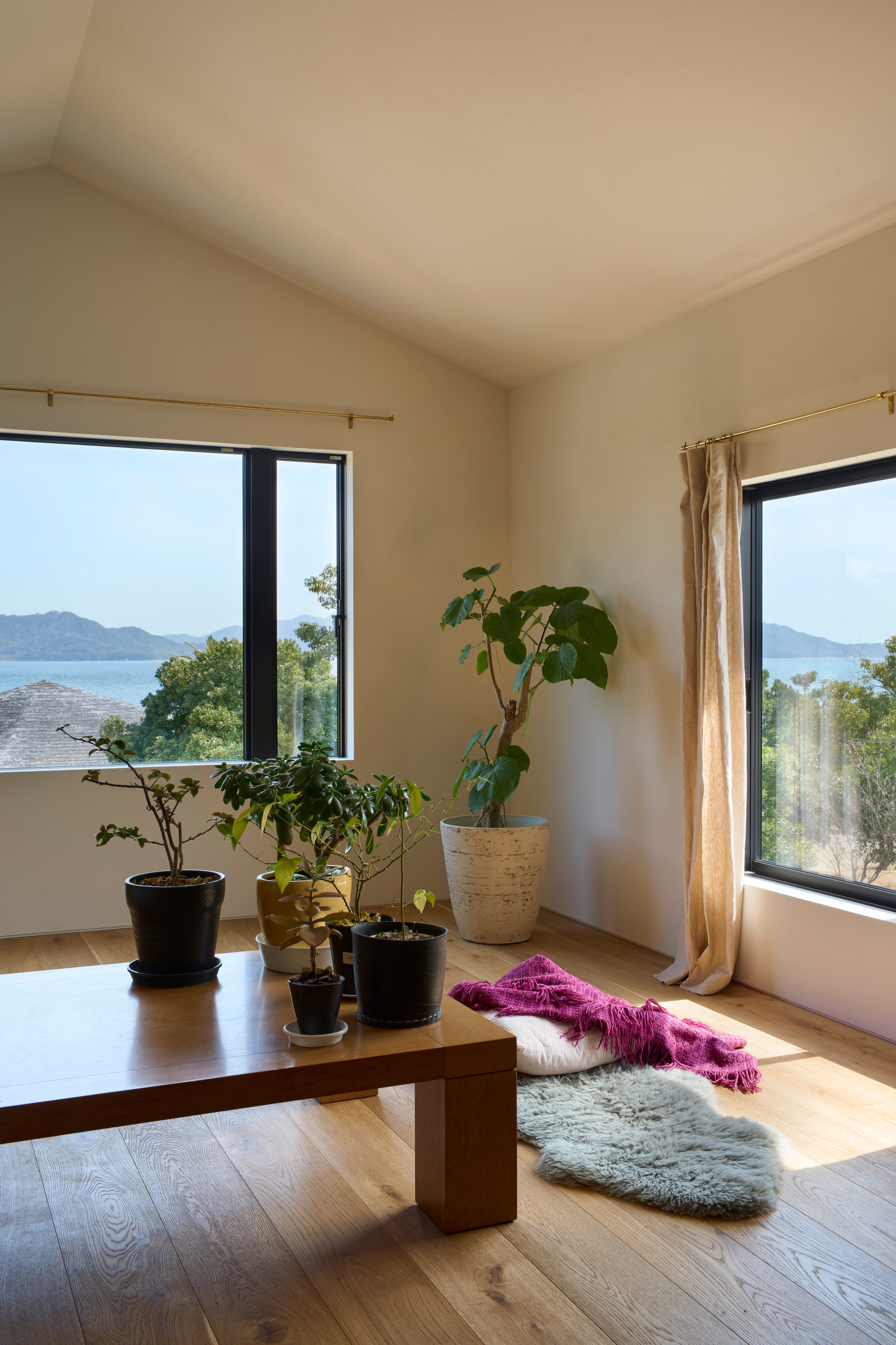 The house's window arrangement accommodates both East and West ways of living