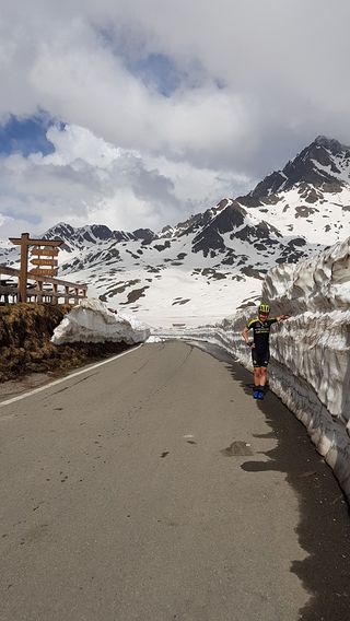 Snow lines the side of the roads at the top of the Passo Gavia