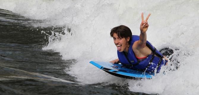 Syd Schultz boogie boards the Arkansas river in Salida, CO