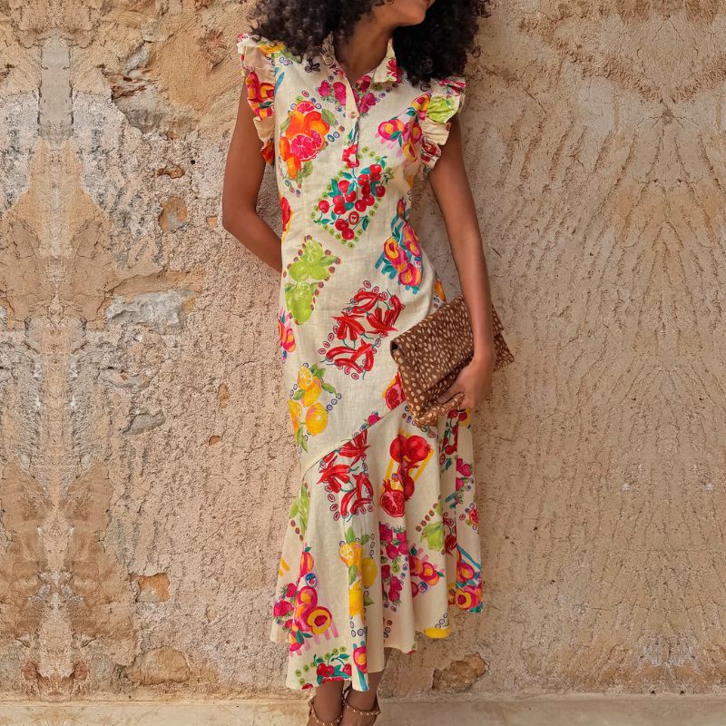 Charlote Hawkins' ruffle sleeve midi dress from Never Fully Dressed