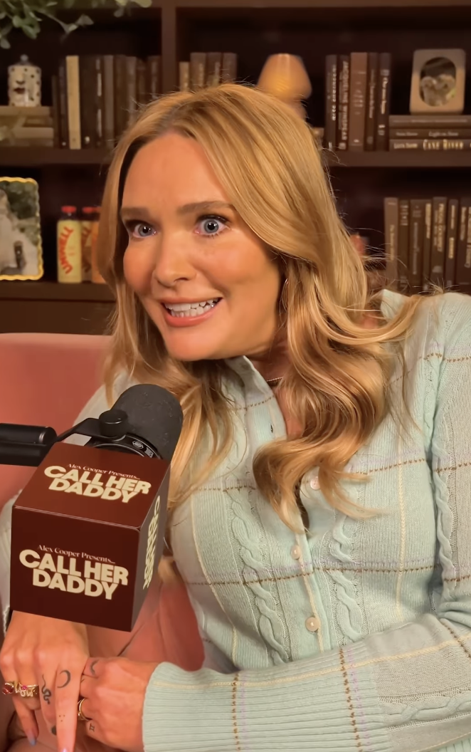 Sarah J Maas wearing a guest in residence cardigan on Call Her Daddy