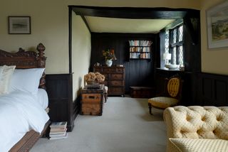 panelled bedroom in Elizabethan manor - Britain's oldest home