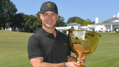 Trevor Immelman with Presidents Cup trophy