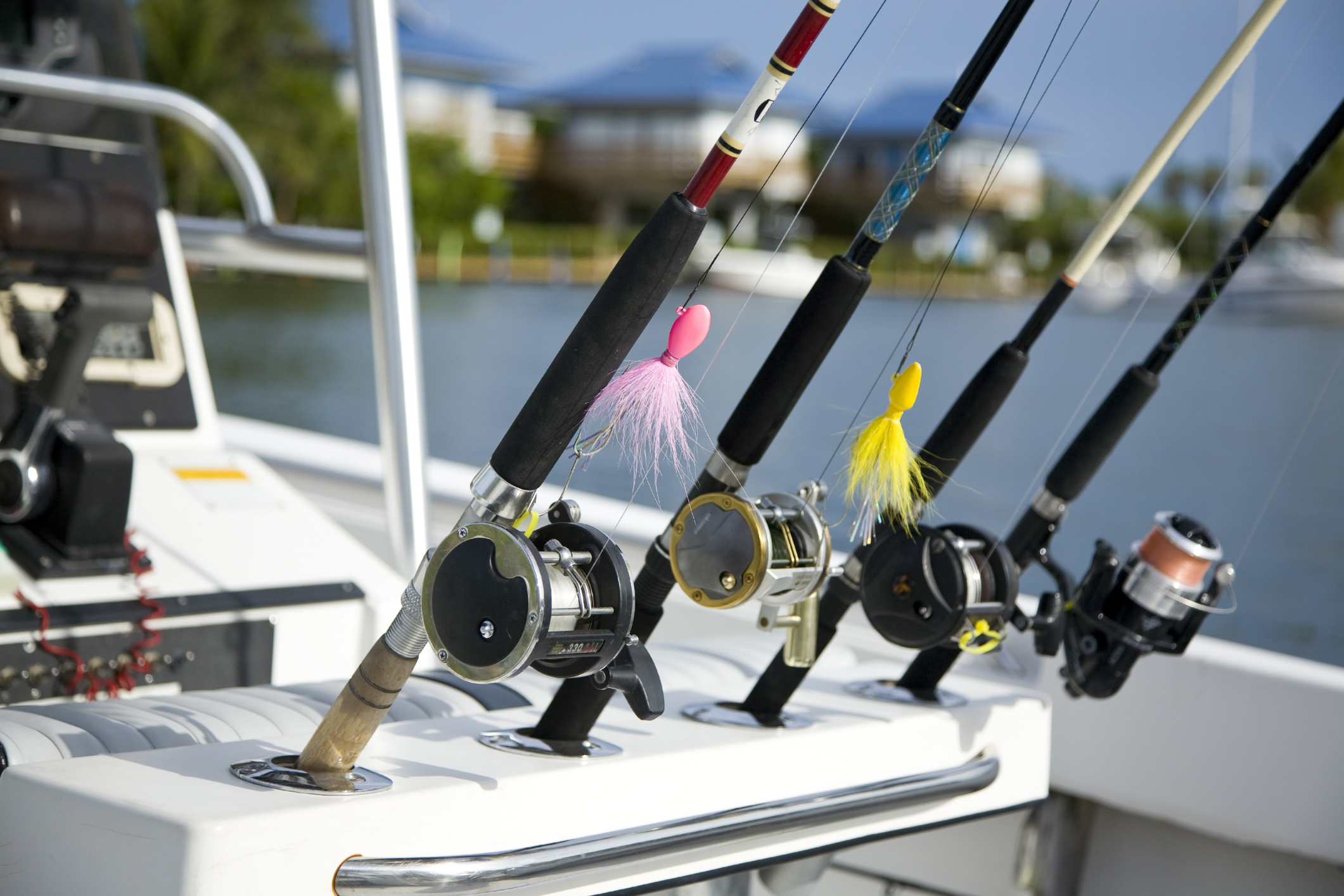 four fishing reels on a boat