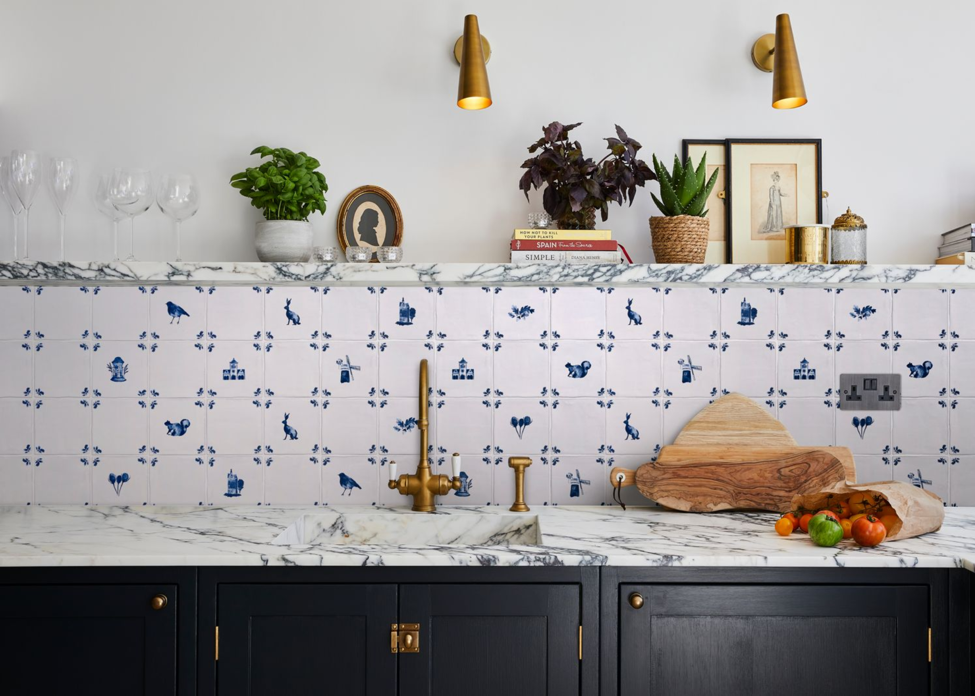 kitchen backsplash with delft tiles including some painted, motif tiles and other simple tiles