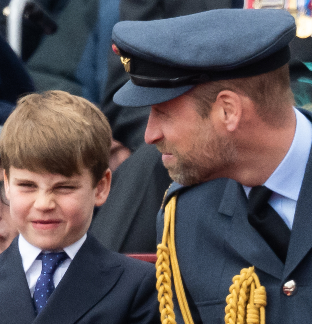 Prince Louis and Prince William sitting next to each other at the VE Day 80 parade