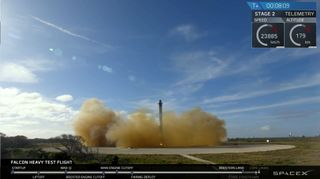 Side boosters land successfully