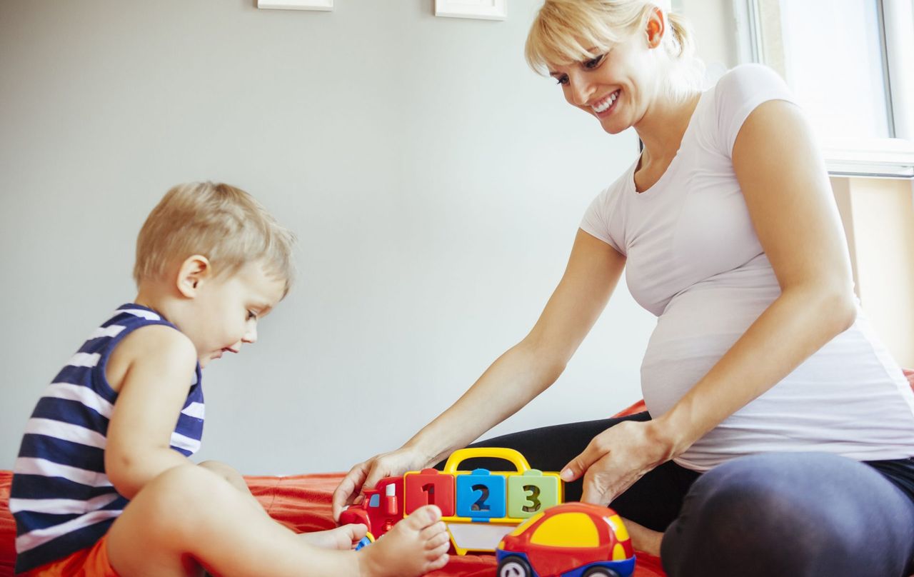 pregnant mother and toddler