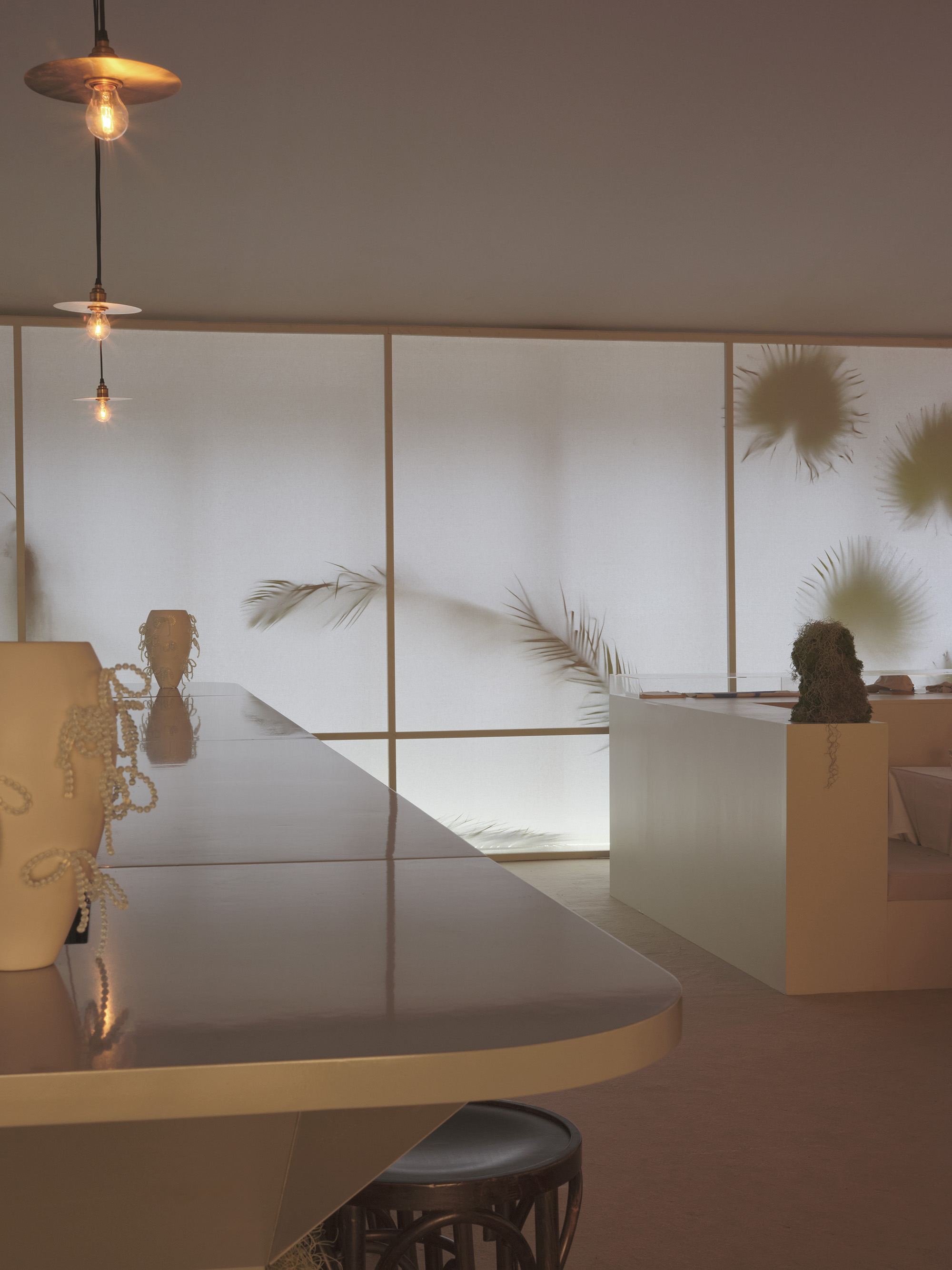 Frieze entrance pavilions London 2025 restaurant interior in moody dappled light