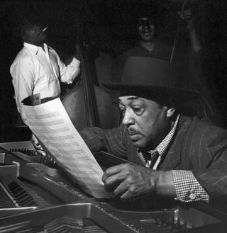 Duke Ellington rehearsing on stage at the Savoy, Chicago, USA, 1948