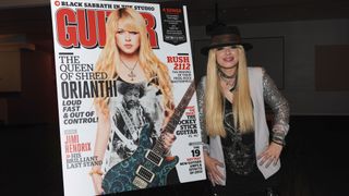 Musician Orianthi poses before Great Guitars: Orianthi at The GRAMMY Museum on March 11, 2013 in Los Angeles, California.