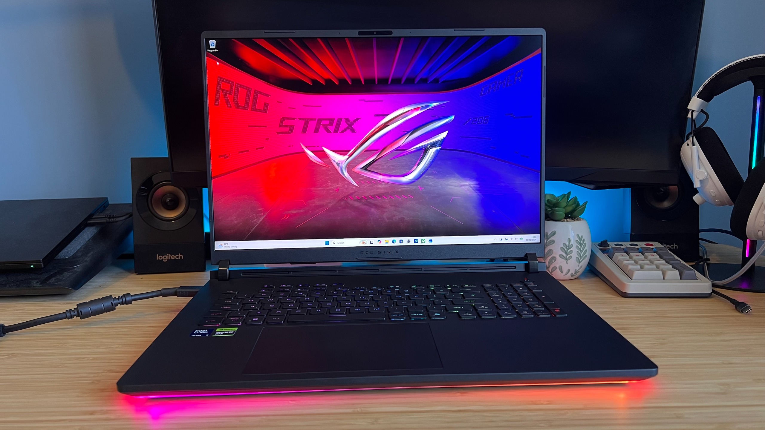 2026 Asus ROG Strix Scar 18 gaming laptop on a wooden desk