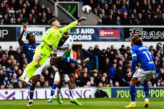 Goalkeeper Michael Cooper punches the ball during the Sky Bet League 1 match between Ipswich Town and Plymouth Argyle at Portman Road, Ipswich on Saturday 14th January 2023.