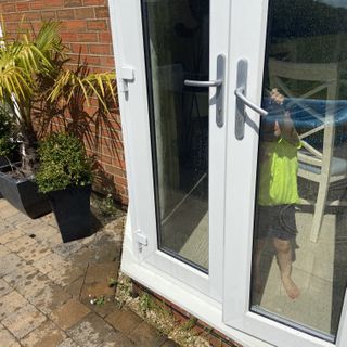 French doors after pressure washer cleaning