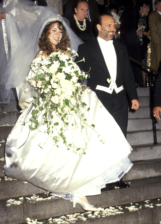 Mariah Carey and Tommy Mottola at the St Thomas Episcopal Church/Metropolitan Club in New York City in 1993