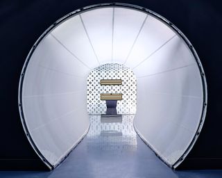 Louis Vuitton Exhibition in London white tunnel made of sail cloth