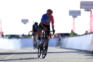 JEBEL HAFEET UNITED ARAB EMIRATES FEBRUARY 11 Silvia Persico of Italy and UAE Team ADQ crosses the finish line during the 1st UAE Tour Women 2023 Stage 3 a 107km stage from Hazza bin Zayed Stadium Al Ain to Jebel Hafeet 1030m UAETourWomen UCIWWT on February 11 2023 in Jebel Hafeet United Arab Emirates Photo by Tim de WaeleGetty Images