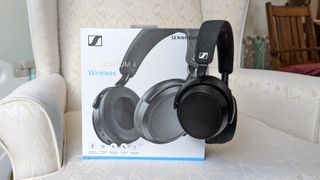 The Sennheiser Momentum 4 hanging from its packaging