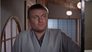 Charles Gray answers the door in a kimono in You Only Live Twice.