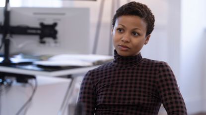 myhala as harper sitting in an office wearing a turtleneck in the industry season 3 finale