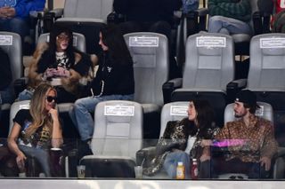 Khloe Kardashian (C), Canadian model Winnie Harlow (middle row, C), Canadian singer-songwriter Justin Bieber (R) and his wife US model Hailey Bieber attend Super Bowl LVIII.