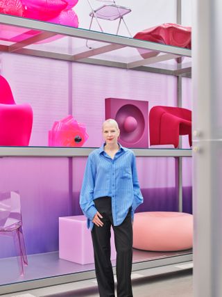Portrait of Sabine Marcelis with pink furniture at Vitra Design Museum Schaudepot