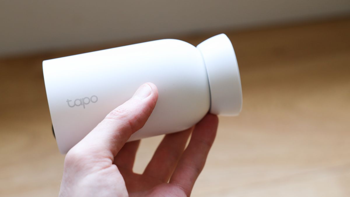 TP-Link Tapo C425 security camera held in a hand
