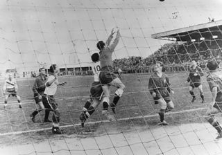 Spain in action against the USA at the 1950 World Cup.
