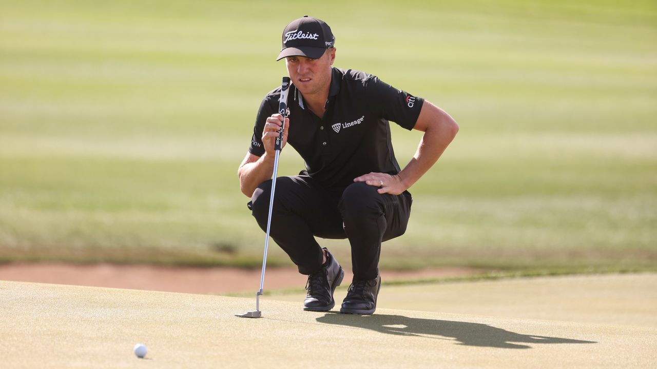 Justin Thomas reads a putt on the third hole at TPC Scottsdale