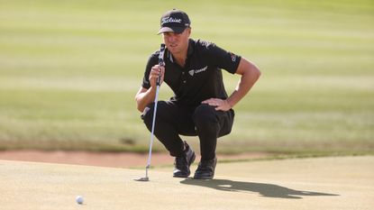 Justin Thomas reads a putt on the third hole at TPC Scottsdale