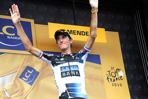 Andy Schleck arrives on stage for his yellow jersey.