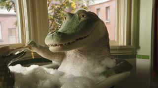 A still from the movie Lyle, Lyle, Crocodile of Lyle in a bathtub.