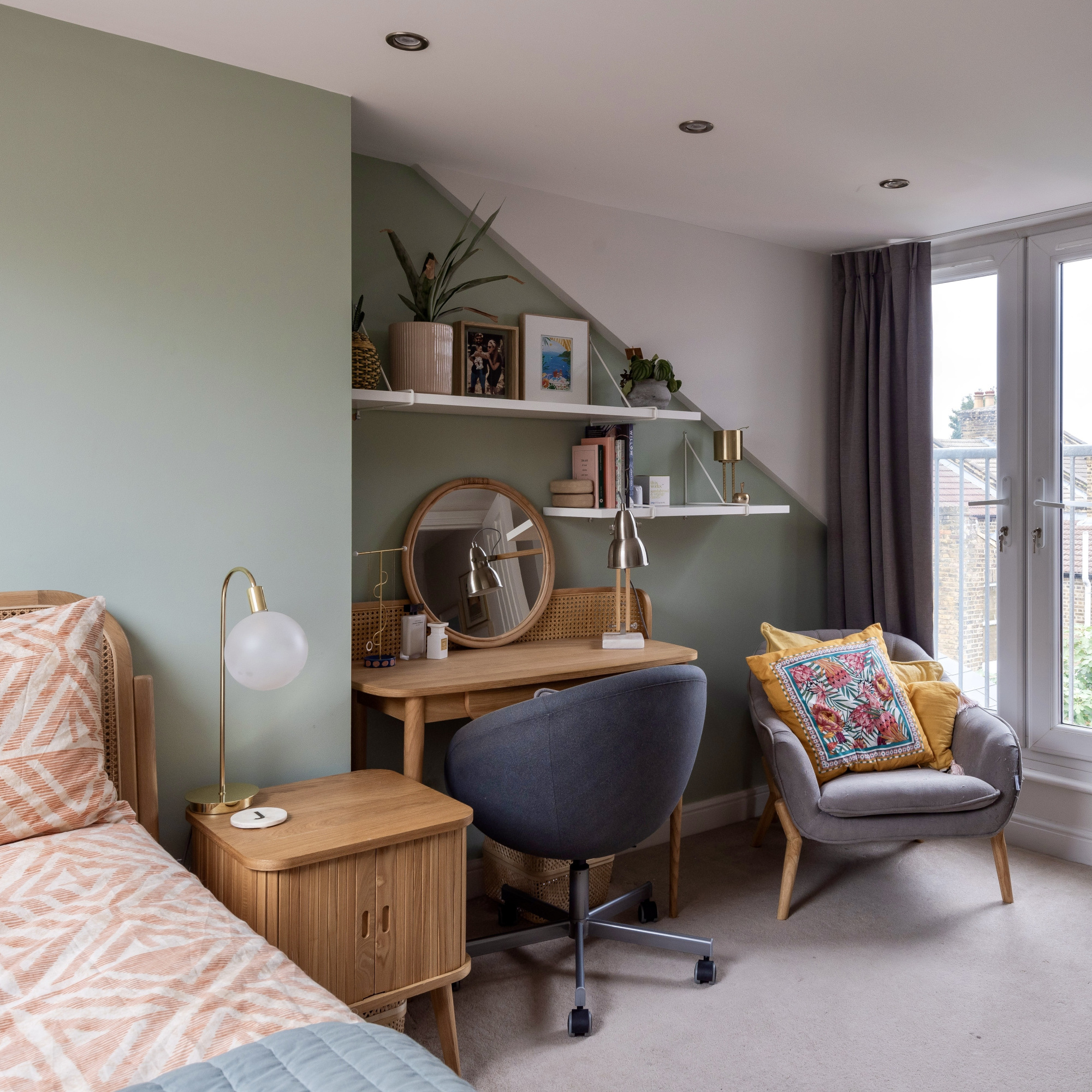 loft bedroom painted green with open shelving
