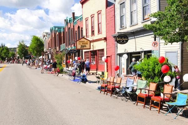 Spectators claim their spots on Main Street in Breckenridge hours before the race starts.