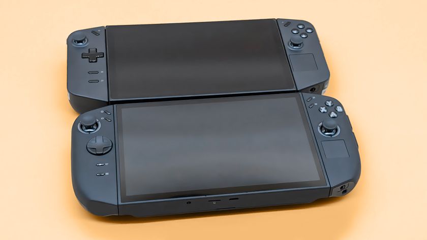 Lenovo Legion Go 2 and original Legion Go lying on their backs with their screens off. 