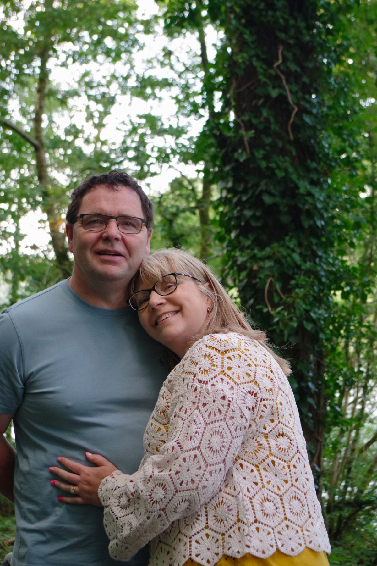 Man and woman hugging, photo taken using Pentax KF