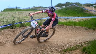 Rider racing on the new Proven Carbon Race XC