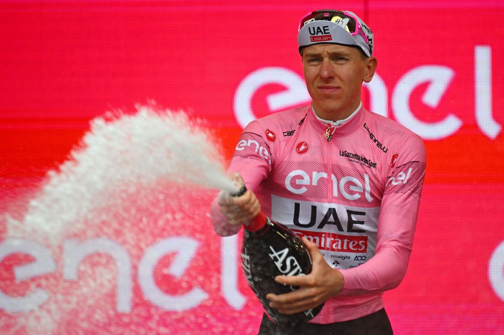 FOSSANO ITALY MAY 06 Tadej Pogacar of Slovenia and UAE Team Emirates celebrates at podium as Pink Leader Jersey winner during the 107th Giro dItalia 2024 Stage 3 a 166km stage from Novara to Fossano 374m UCIWT on May 06 2024 in Fossano Italy Photo by Tim de WaeleGetty Images