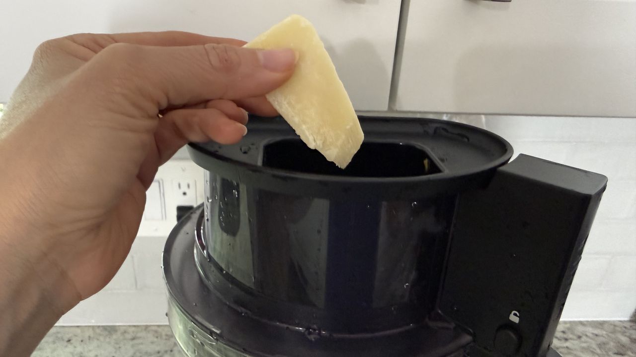 Ninja CrushBOSS shredding parmesan cheese