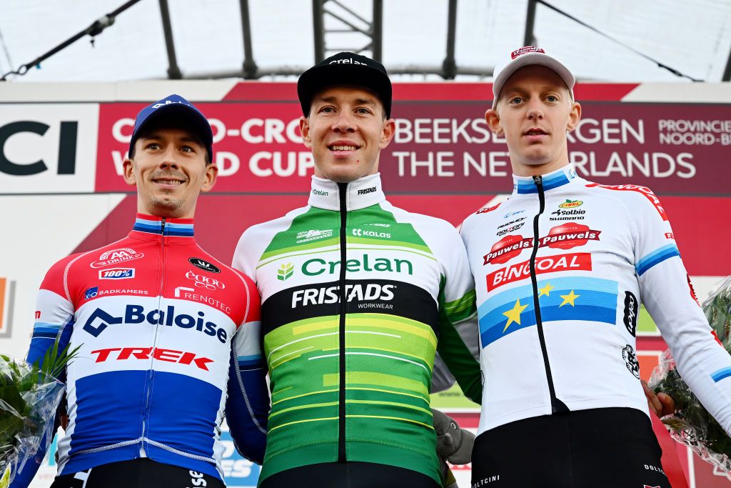 BERGEN NETHERLANDS NOVEMBER 13 LR Lars Van Der Haar of The Netherlands and Team Baloise Trek Lions on second place race winner Laurens Sweeck of Belgium and Team CrelanFristads and Michael Vanthourenhout of Belgium and Team Pauwels Sauzen Bingoal on third place pose on the podium ceremony after the 1st UCI Cyclocross World Cup Beekse Bergen 2022 Mens Elite CXWorldCup BeekseBergen Cyclocross on November 13 2022 in Bergen Netherlands Photo by Luc ClaessenGetty Images