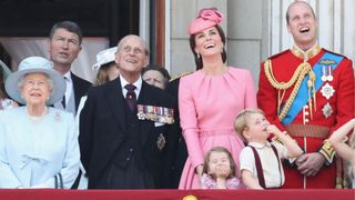 (L-R) Queen Elizabeth II, Prince Philip, Duke of Edinburgh, Catherine, Duchess of Cambridge, Princess Charlotte of Cambridge, Prince George of Cambridge and Prince William, Duke of Cambridge look out from the balcony of Buckingham Palace during the Trooping the Colour parade on June 17, 2017 in London, England