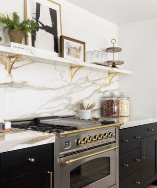 A kitchen with slab marble backsplash