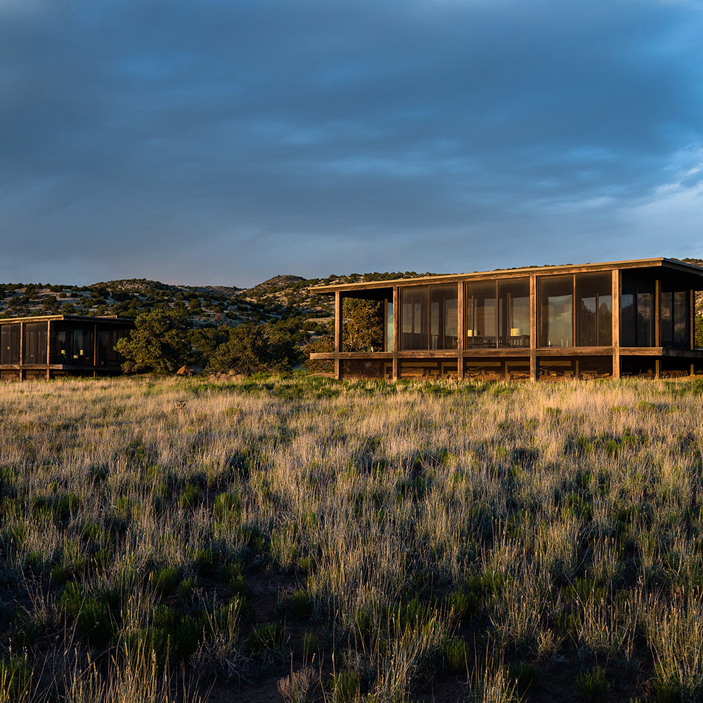 outdoor view of guest house with grass