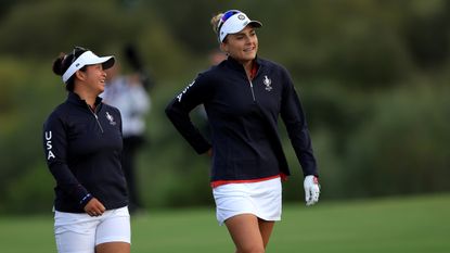 Megan Khang and Lexi Thompson walk at the Solheim Cup