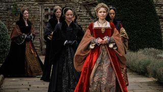 A regal Jane Seymour (Kate Phillips) and her ladies-in-waiting outside, in a photo of Wolf Hall: The Mirror and the Light.