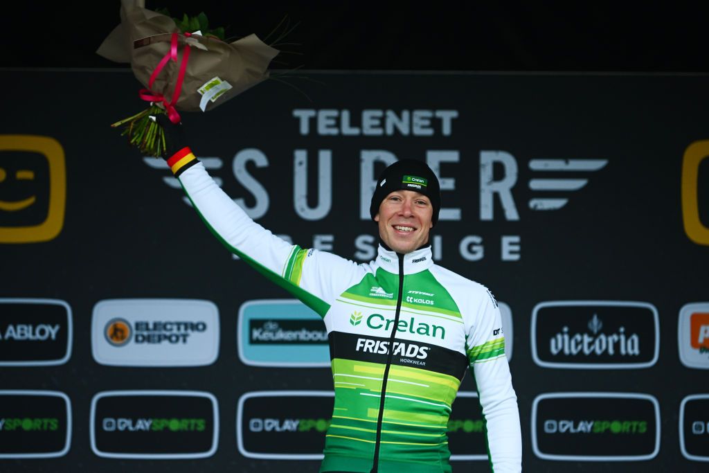 RIJKEVORSEL BELGIUM NOVEMBER 19 Laurens Sweeck of Belgium and Team CrelanFristads celebrates at podium as race winner during the 36th Superprestige Merksplas 2022 Mens Elite Superprestige2023 CXWorldCup CycloCross on November 19 2022 in Rijkevorsel Belgium Photo by Luc ClaessenGetty Images