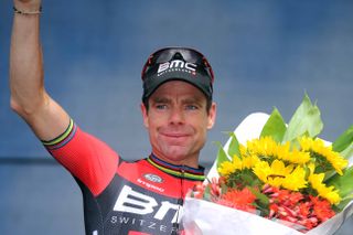 Cadel Evans (BMC) waves from the podium