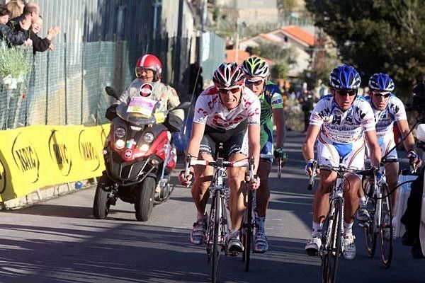 Alessandro Bertolini started things on the Poggio and his team-mate came up, too. Bertolini is taking a breather at the back here.